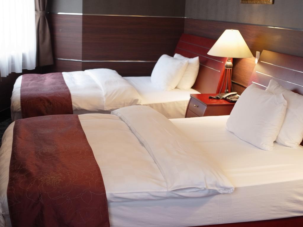 King Ambassador Hotel Кумагая Номер фото