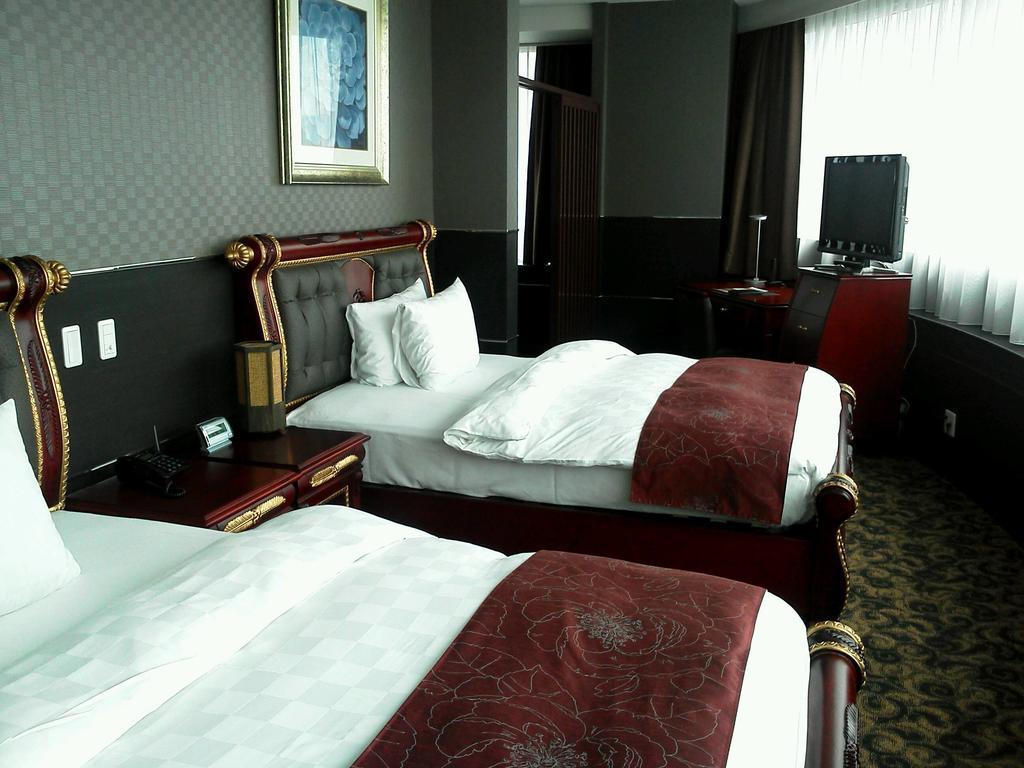King Ambassador Hotel Кумагая Номер фото